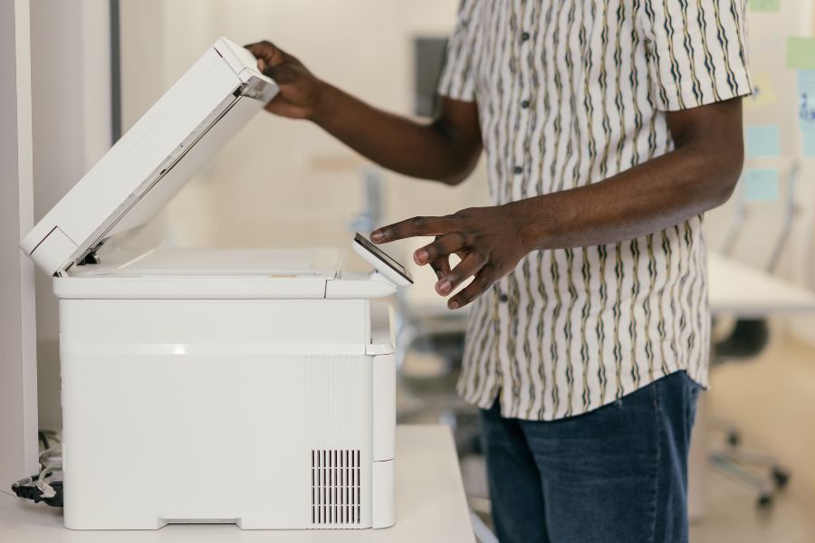 Mans arms and body shown using a photcopier