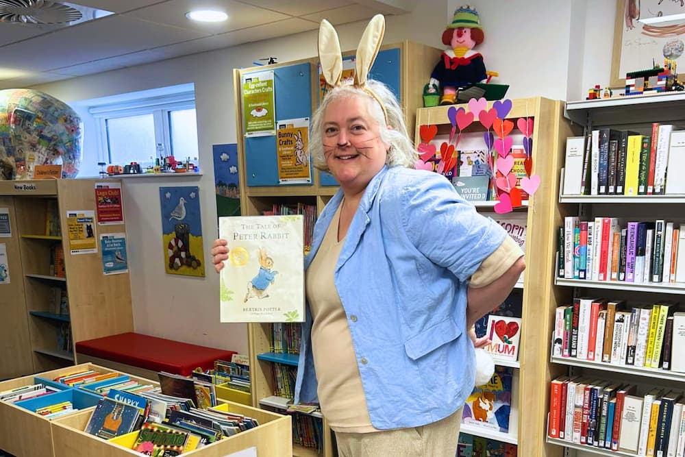 Charlotte Clark, Manager of Southwold Library, dressed as Peter Rabbit for World Book Day