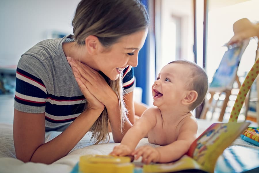 Mother and child stock A mother reading with her baby
