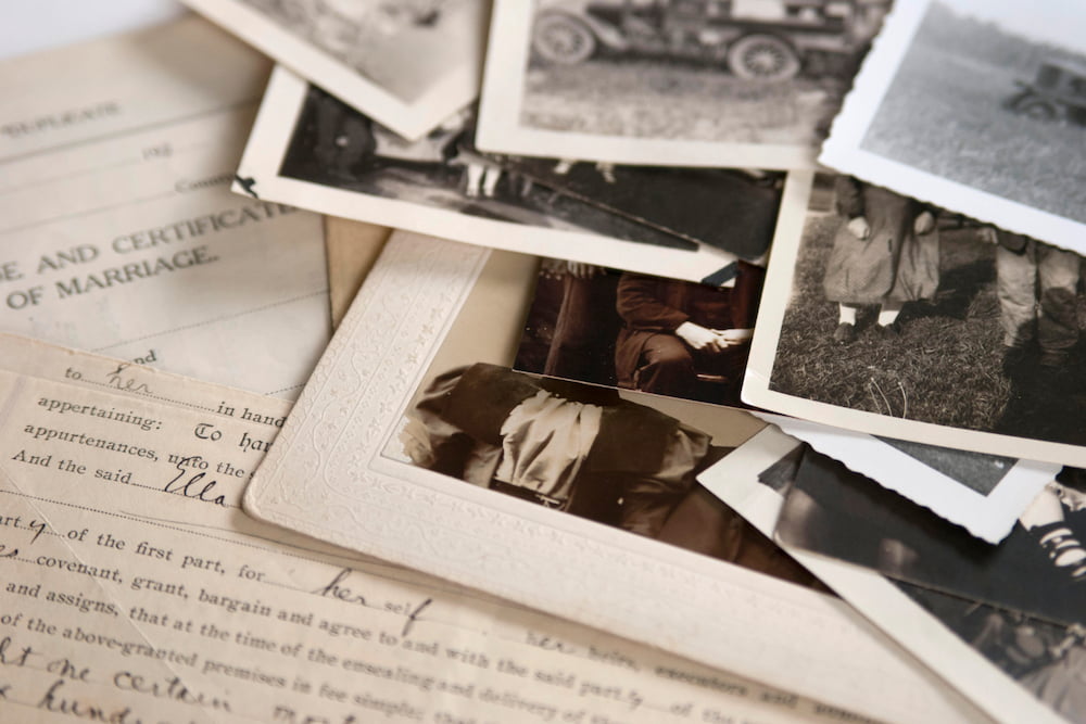 Family history ancestry photographs stock 3x2 resize Close up of old photographs and family history records