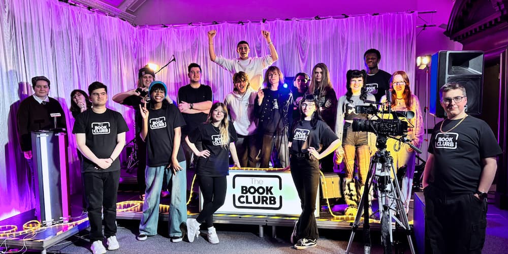 The Book Clurb Group Shot v2 2x1 resize Group shot of the students from Suffolk New College at the Book Clurb live gig at Ipswich County Library