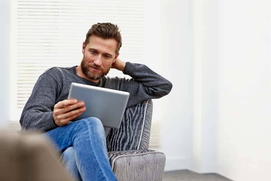 Man reading on a tablet