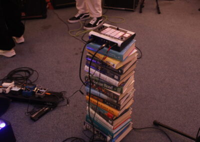 Stack of books with PA equipment
