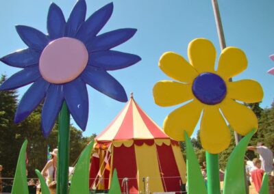 Colourful plastic flowers outside the libraries tent