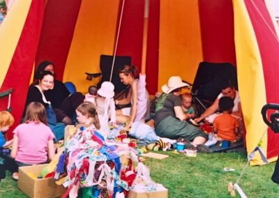 Families enjoying activities in the libraries tent