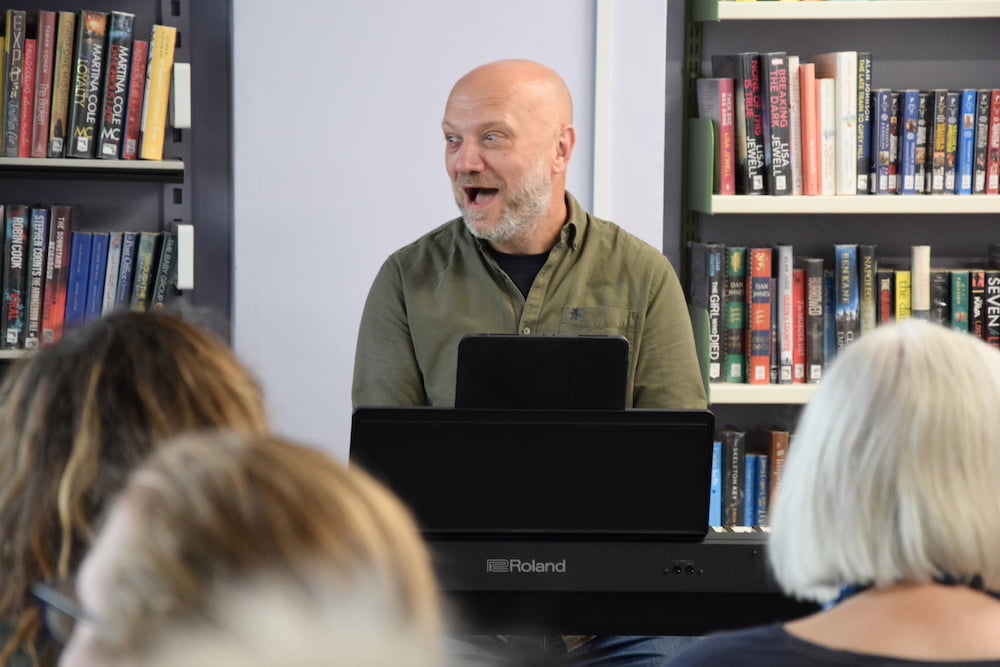 Francis Goodhand facilitating a Tonic: Singing for Health session at Leiston Library