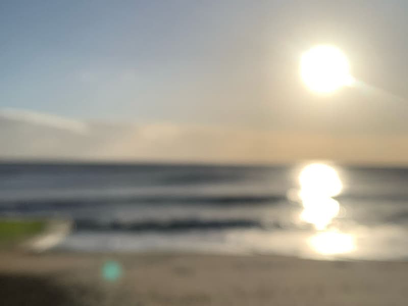 Blurry image of Felixstowe coast at sunrise